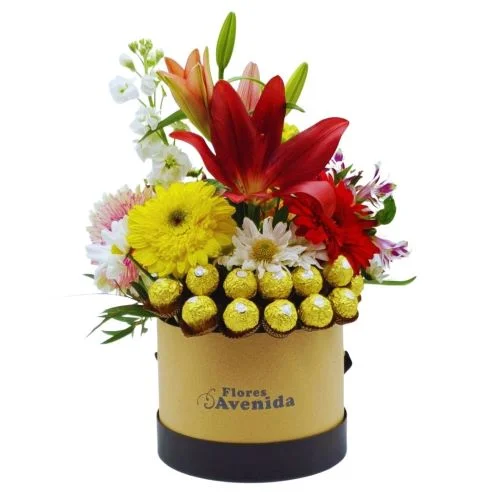 Caja pote con flores de estacion y chocolates